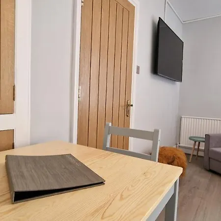 Woodland Family With Electric Car Point